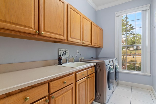 washroom featuring cabinets, a wealth of natural light, crown molding, and independent washer and dryer