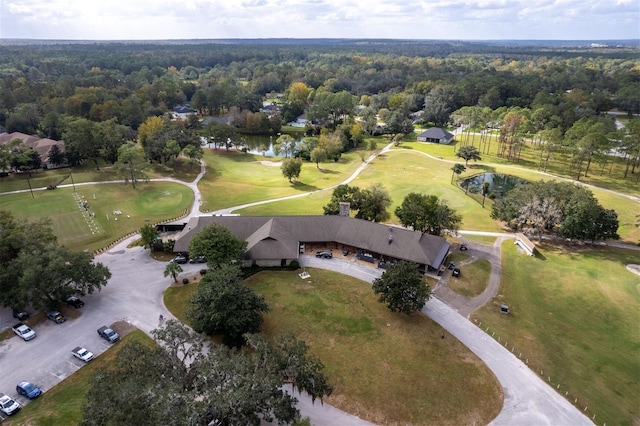 6225 NW 105th Ave, Alachua, FL 32615 - aerial overview of property's location with a nearby body of water, a local golf course, and a forest