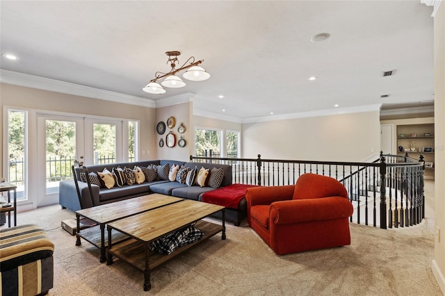 carpeted living room featuring french doors and ornamental molding