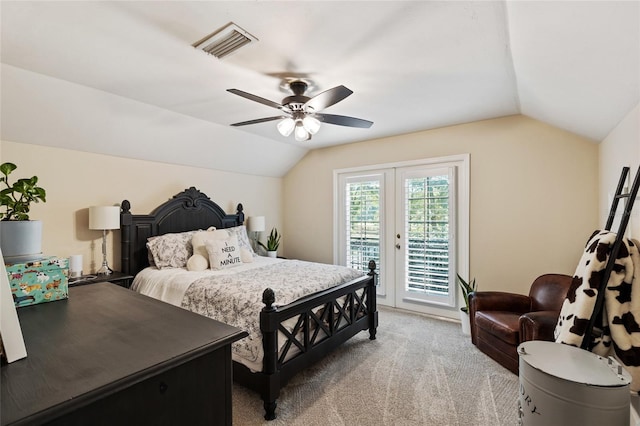 carpeted bedroom featuring access to outside, lofted ceiling, and ceiling fan