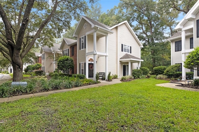 view of front of property with a front lawn