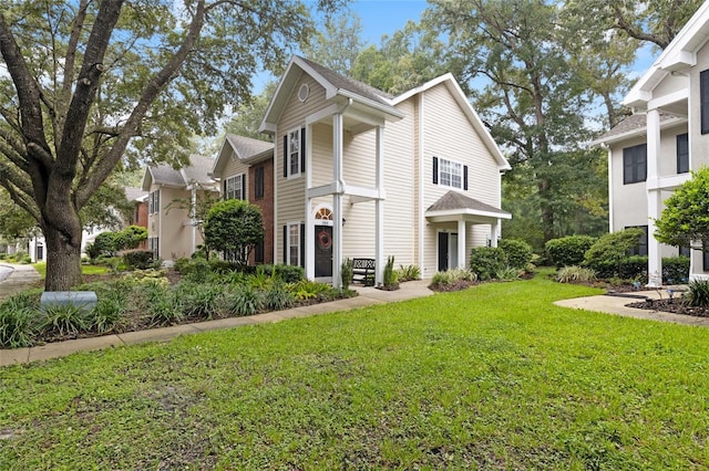 10000 SW 52nd Ave Unit 164, Gainesville, FL 32608 - view of front of property featuring a front lawn