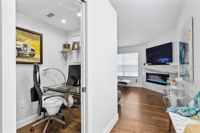 10000 SW 52nd Ave Unit 164, Gainesville, FL 32608 - office space featuring wood finished floors, a glass covered fireplace, and recessed lighting