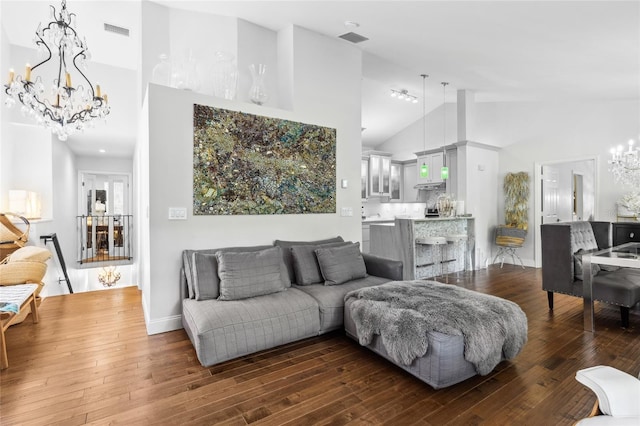 10000 SW 52nd Ave Unit 164, Gainesville, FL 32608 - living area featuring a chandelier, high vaulted ceiling, and hardwood / wood-style flooring