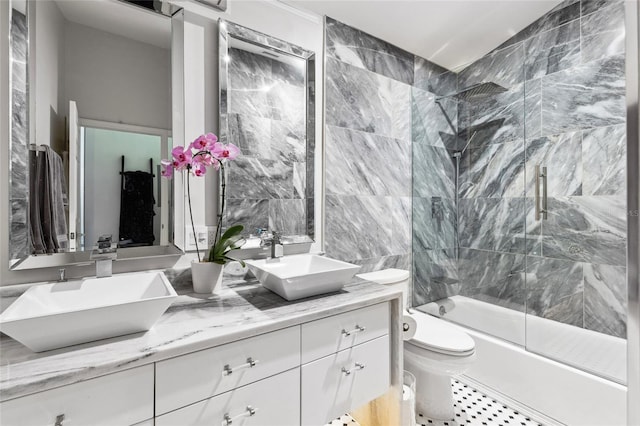 10000 SW 52nd Ave Unit 164, Gainesville, FL 32608 - bathroom with double vanity and shower / bath combination with glass door