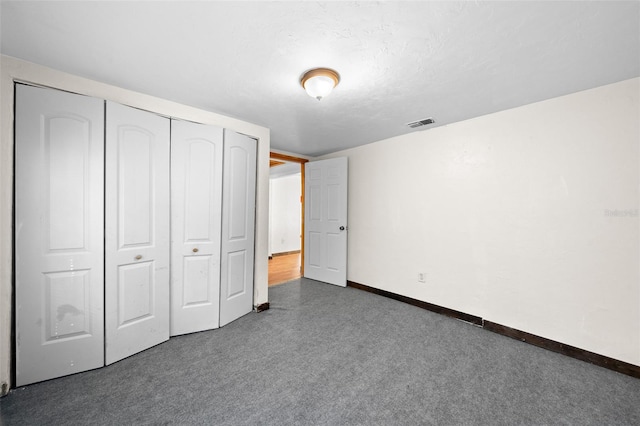 unfurnished bedroom featuring a closet