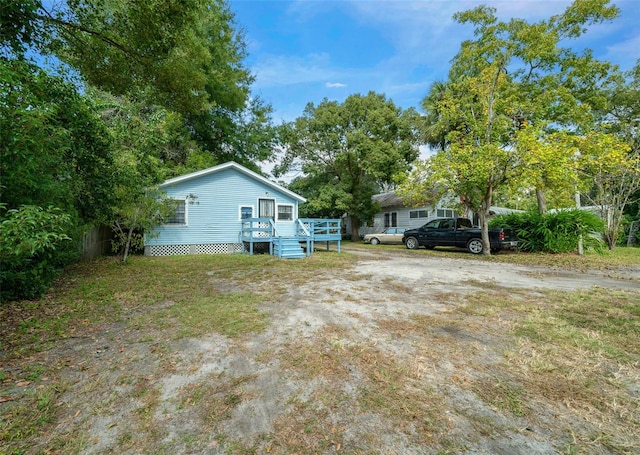 view of yard featuring a wooden deck