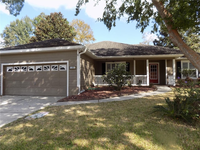 single story home featuring a front yard, a porch, and a garage