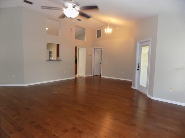 unfurnished living room featuring high vaulted ceiling, ceiling fan with notable chandelier, and dark hardwood / wood-style flooring