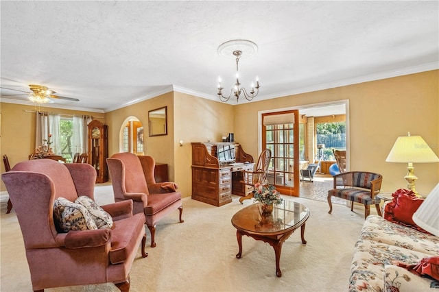 living room with crown molding, a textured ceiling, light colored carpet, and ceiling fan with notable chandelier