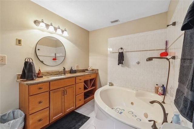 bathroom with vanity and tile patterned flooring