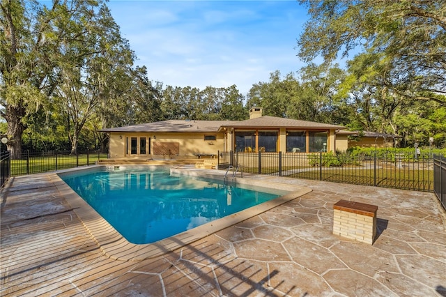 view of pool featuring a patio area