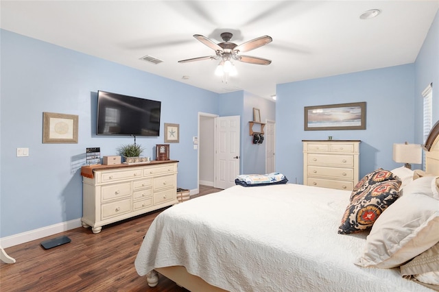 bedroom featuring ceiling fan and dark hardwood / wood-style flooring