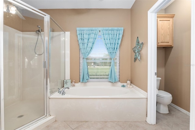 bathroom with ceiling fan, tile patterned floors, toilet, and shower with separate bathtub