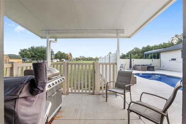 view of patio / terrace featuring a fenced in pool