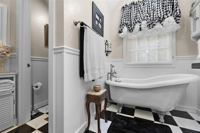 bathroom featuring a tub