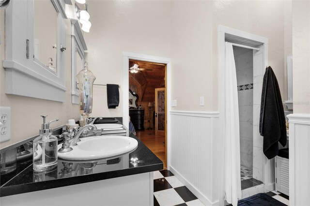 bathroom with vanity and a shower with shower curtain