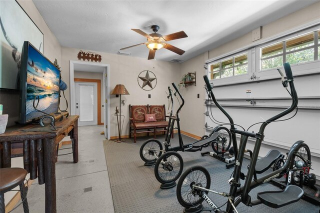 exercise area with ceiling fan