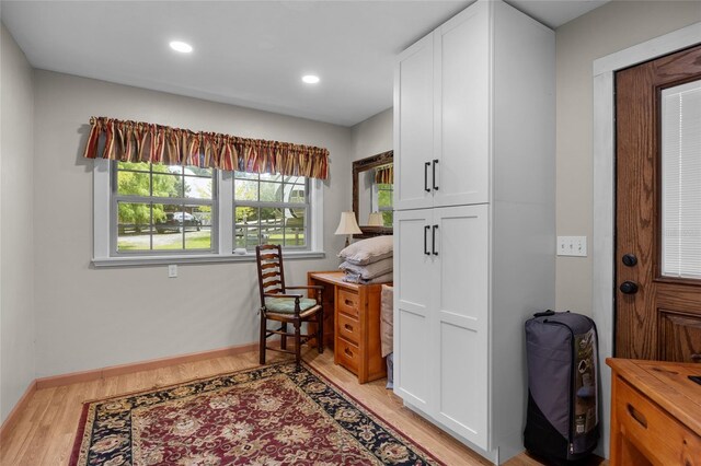 office space with light hardwood / wood-style floors