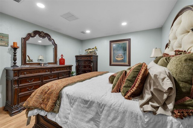 bedroom featuring light hardwood / wood-style flooring