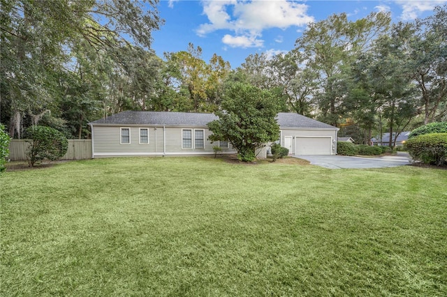 single story home featuring a garage, driveway, a front yard, and fence