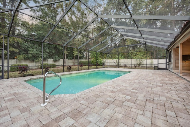 view of pool featuring a fenced in pool, a lanai, a fenced backyard, and a patio