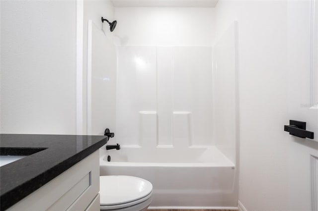 full bathroom featuring shower / washtub combination, vanity, and toilet