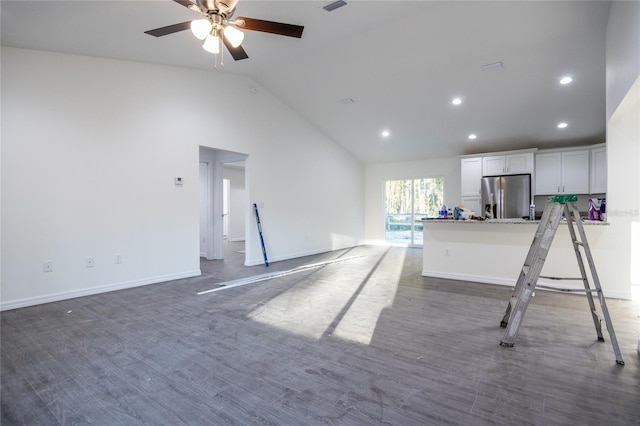 1243 NE 130th Ter, Silver Springs, FL 34488 - kitchen featuring stainless steel fridge with ice dispenser, white cabinetry, a ceiling fan, recessed lighting, and a peninsula
