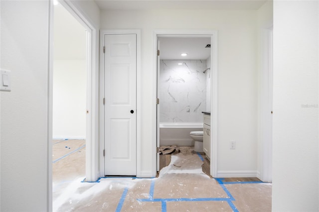 full bath featuring shower / tub combination and baseboards