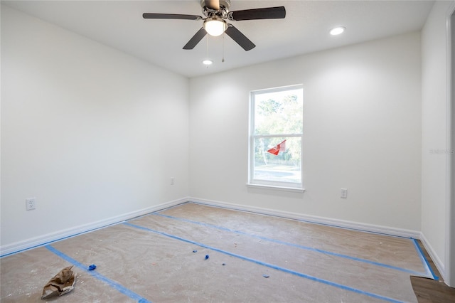 spare room with ceiling fan, baseboards, and recessed lighting