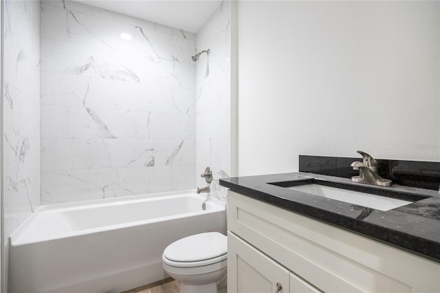 bathroom with shower / bathing tub combination, vanity, and toilet