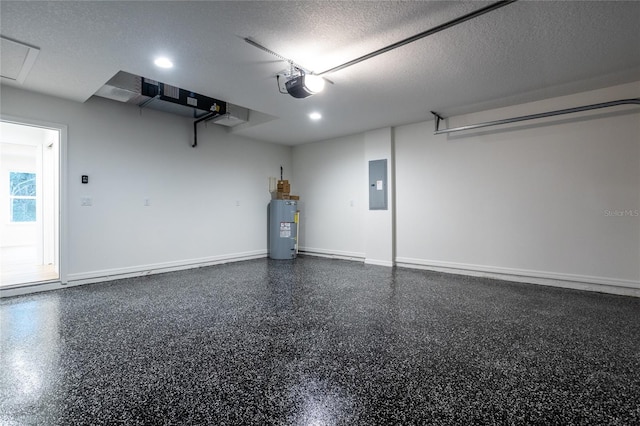 garage featuring water heater, a garage door opener, and electric panel