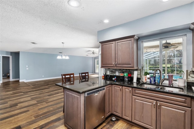 kitchen with dishwasher, kitchen peninsula, dark hardwood / wood-style flooring, and sink