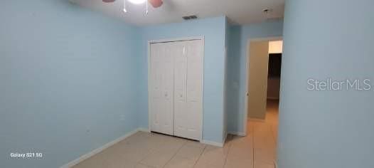 unfurnished bedroom with a closet