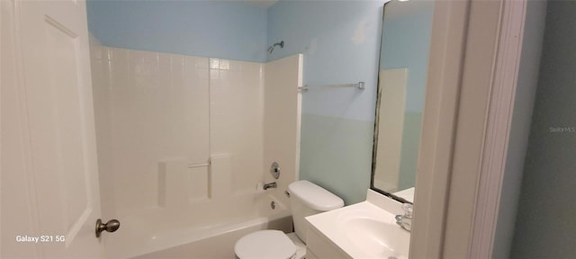 full bathroom with vanity, toilet, and shower / washtub combination