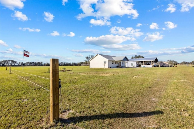 view of yard featuring a rural view