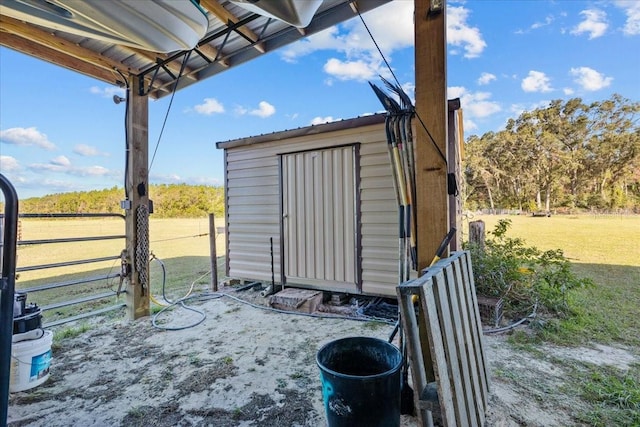 view of outdoor structure with a yard