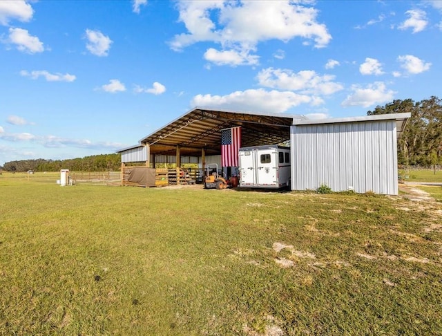 view of outdoor structure with a yard