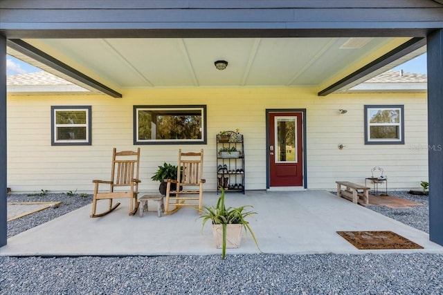 doorway to property with a patio area