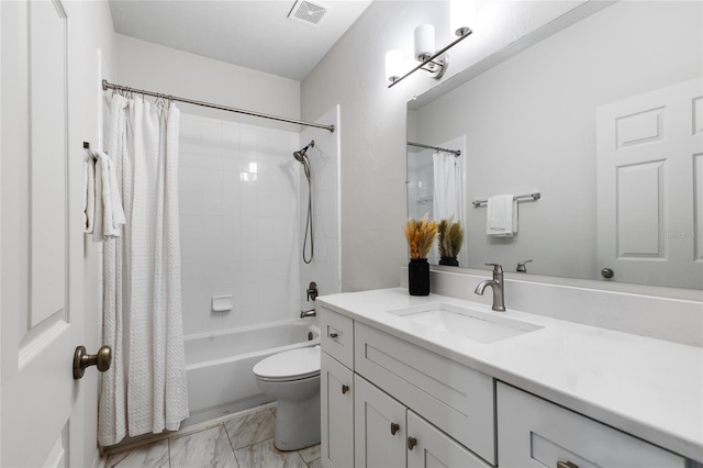 bathroom with visible vents, toilet, marble finish floor, shower / bath combo, and vanity