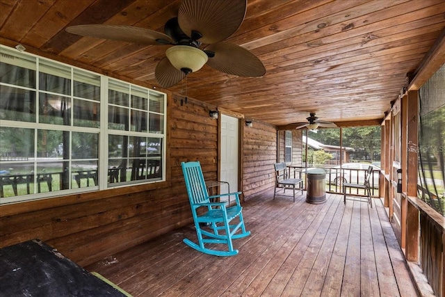 wooden deck featuring ceiling fan and a porch