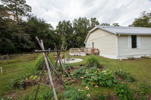 view of yard featuring a deck