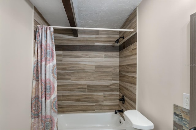 bathroom featuring toilet and shower / tub combo with curtain