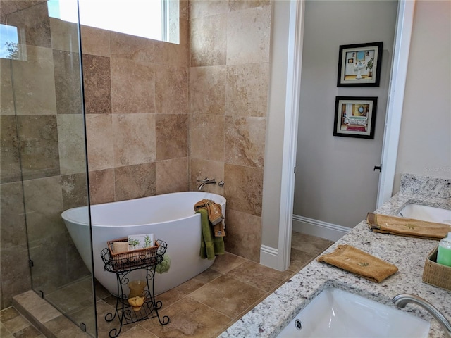 6475 SW 74th Dr, Gainesville, FL 32608 - bathroom featuring a freestanding tub and double vanity