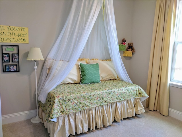 6475 SW 74th Dr, Gainesville, FL 32608 - bedroom featuring baseboards and carpet