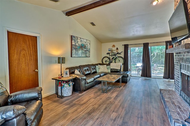 living room with high vaulted ceiling, beamed ceiling, dark hardwood / wood-style floors, and a brick fireplace