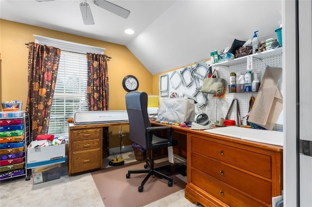 carpeted home office with vaulted ceiling and ceiling fan