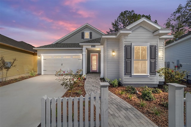 1035 NW 132nd Blvd, Newberry, FL 32669 - ranch-style house with fence, concrete driveway, and a garage