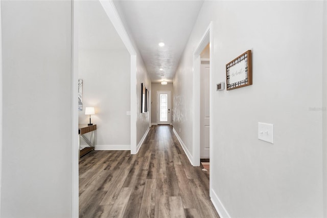 hallway featuring hardwood / wood-style flooring