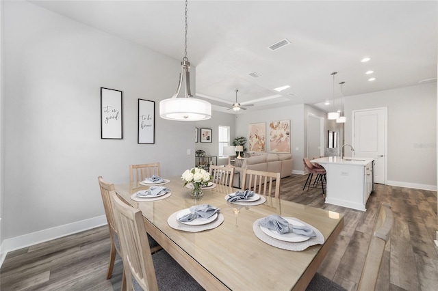 1035 NW 132nd Blvd, Newberry, FL 32669 - dining room with dark wood-type flooring, baseboards, ceiling fan, and recessed lighting